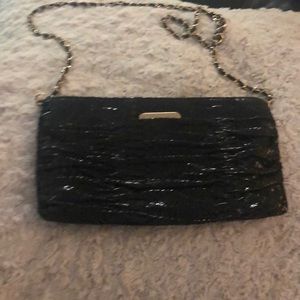 Michael Kors black python clutch purse.